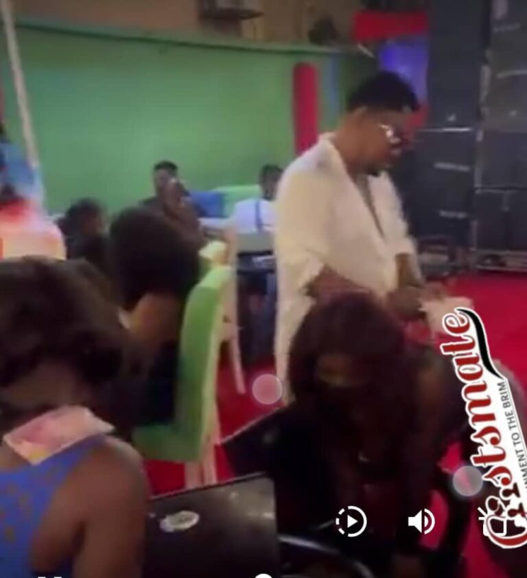 VIRAL VIDEO: EFCC Arrests Suspended Government Official Spraying Money On Strippers In Bar