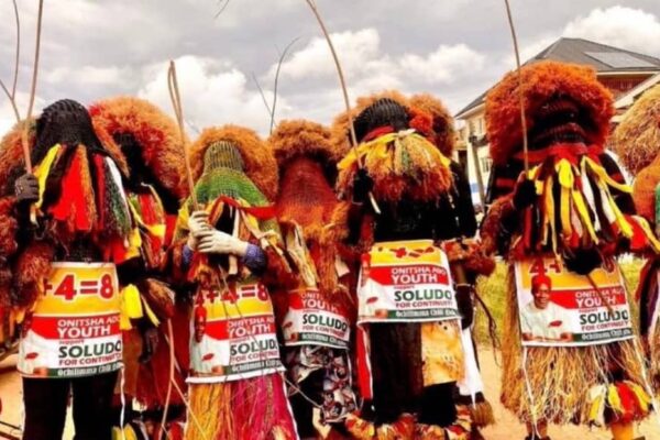 TRENDING: Masquerades Display Soludo’s Campaign Posters Ahead Of Anambra Guber